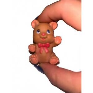 Adorable Brown Bear Figurine with Bow